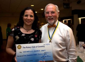 The International Children's Trust being presented with a cheque by the President of the Rotary Club of Coventry